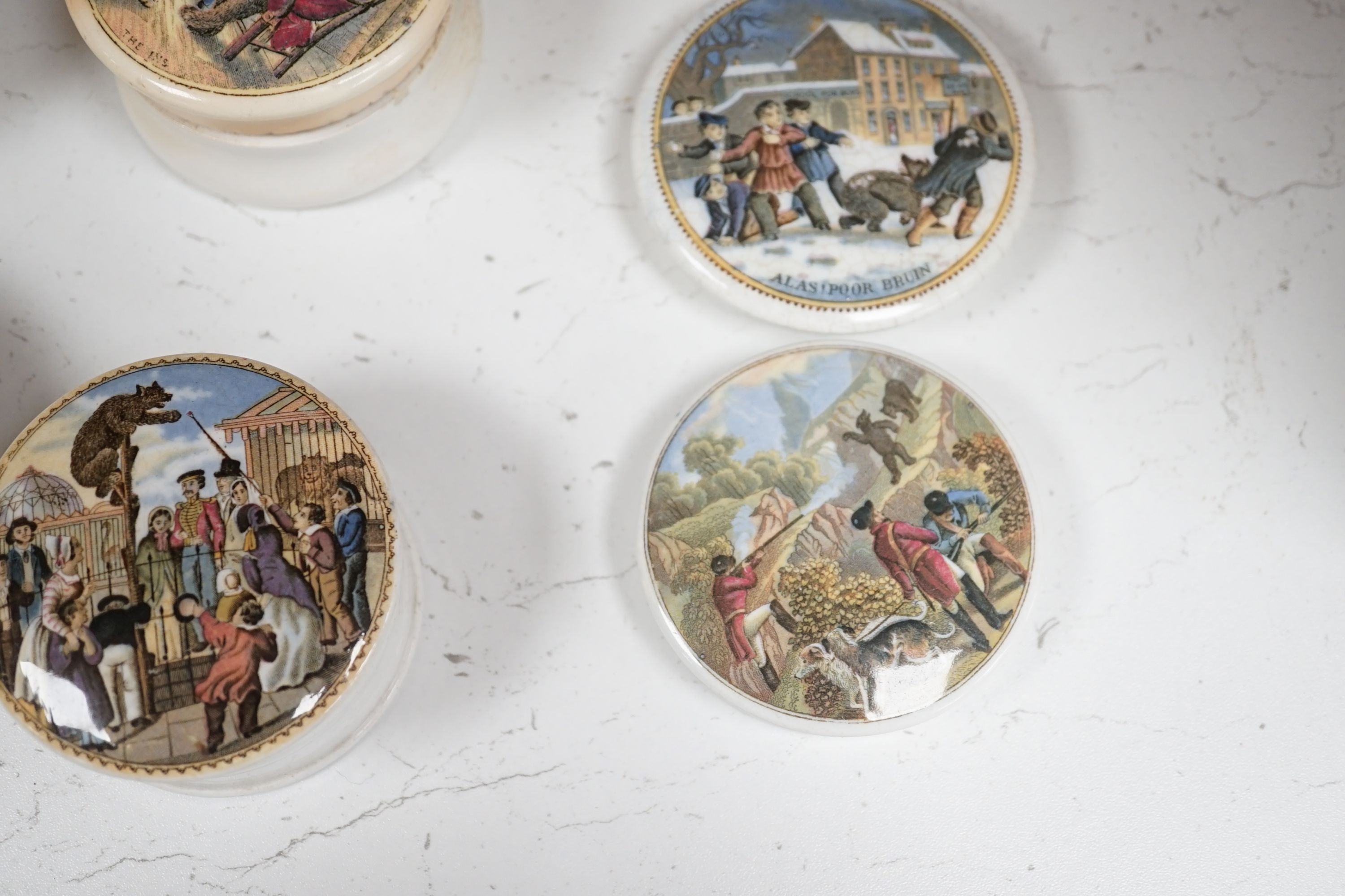 Ten Victorian pot lids including six bear's grease, largest 10.5 cms diameter.